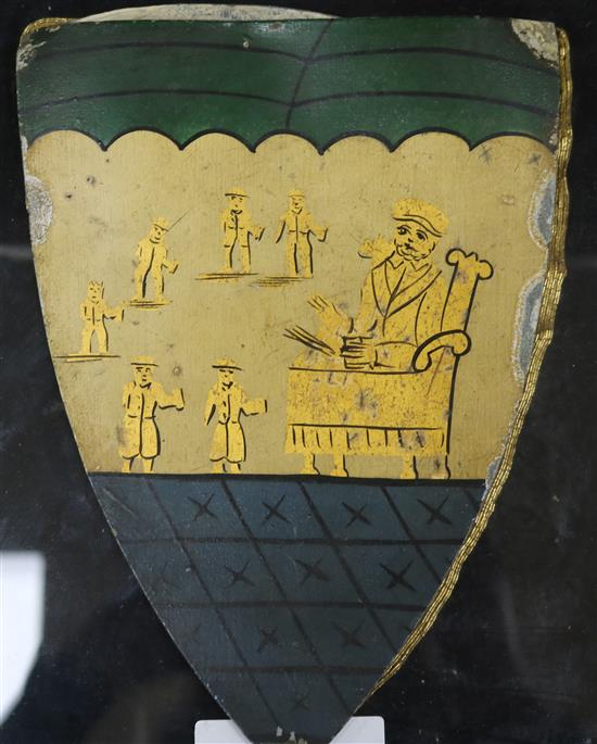 A 19th century silkwork armorial for Uppingham School, a similar painted zinc armorial by Webb of Oxford and